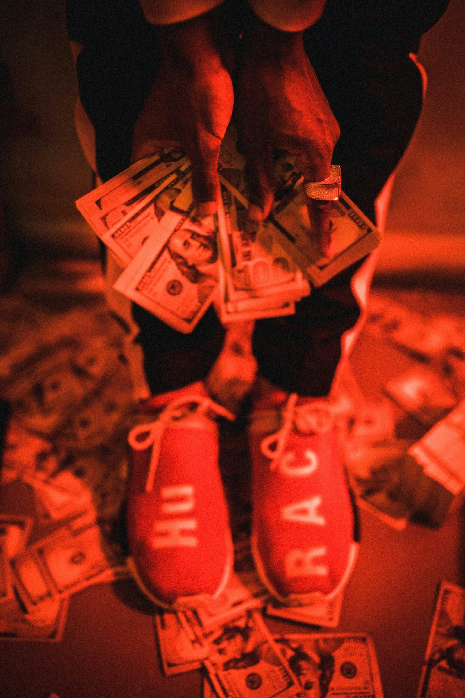 a person standing on top of a pile of money